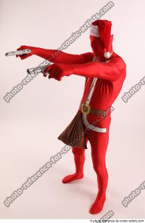 JOEL_ADAMSON CHRISTMAS VILLAIN WITH TWO GUNS